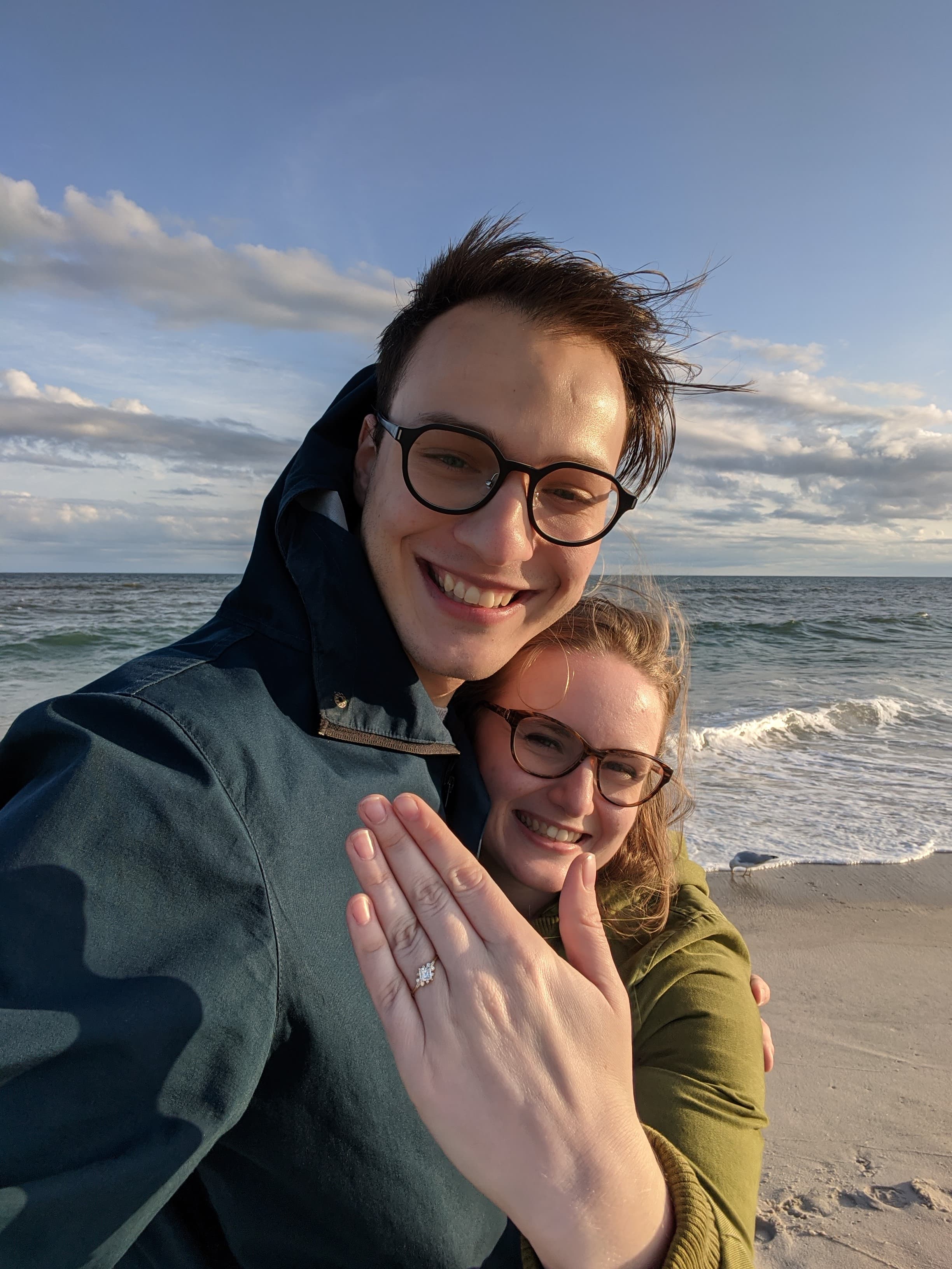 Christian and Sonya after proposal showing off ring